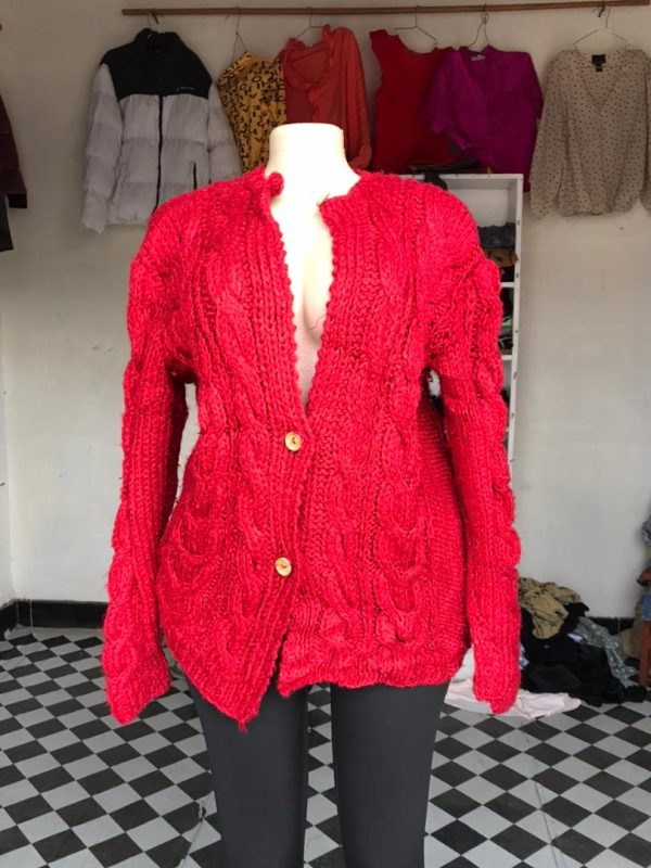 Red cable-knit cardigan sweater